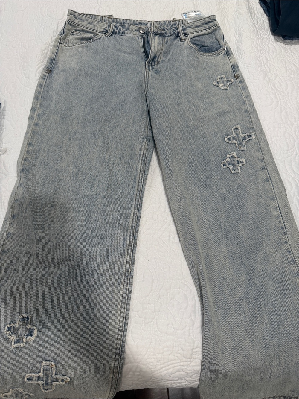 Ksubi Light Gray Distressed Cross Embroidered Jeans with adjustable belt straps